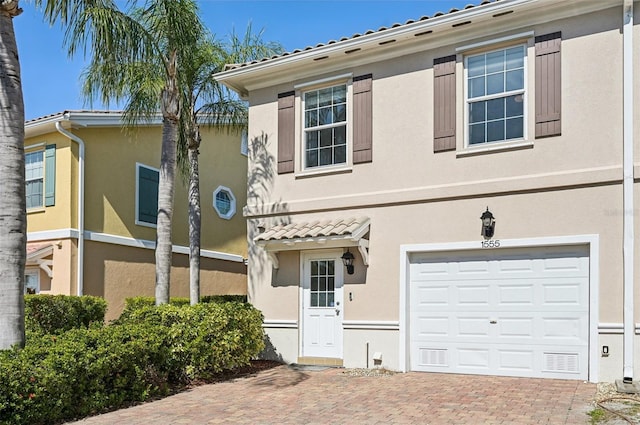 view of front of house with a garage