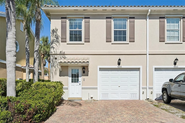 view of front of property with a garage