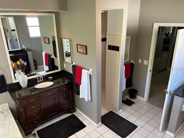 bathroom with vanity and tile patterned flooring