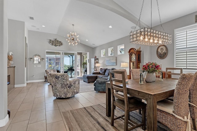 dining space with light tile patterned flooring, recessed lighting, baseboards, and an inviting chandelier