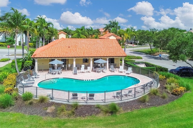 pool featuring a patio and fence