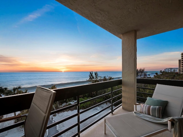 balcony at dusk with a water view