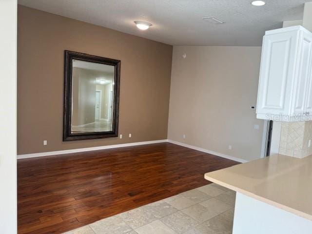 spare room with light wood-type flooring