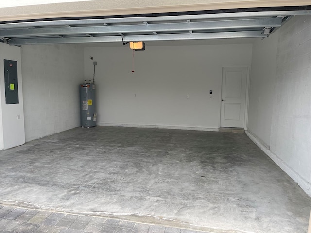 garage featuring water heater, a garage door opener, and electric panel