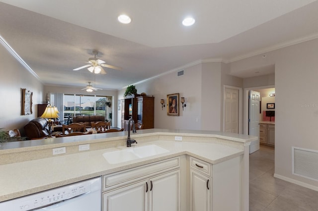 kitchen with light tile patterned flooring, ornamental molding, white dishwasher, and sink