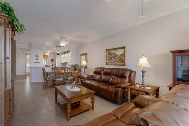 tiled living room with crown molding and ceiling fan