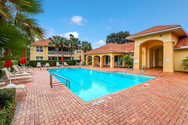 view of pool featuring a patio area