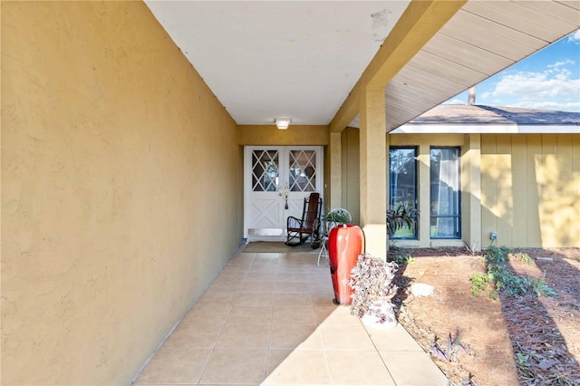 doorway to property with a patio