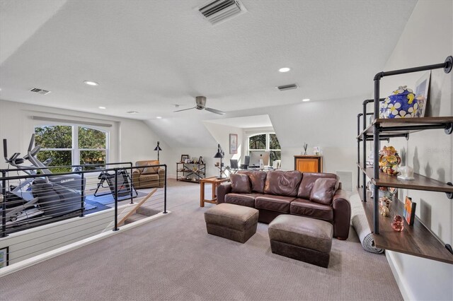 3301 River Woods Dr, Parrish, FL 34219 - carpeted living area with ceiling fan, vaulted ceiling, and recessed lighting