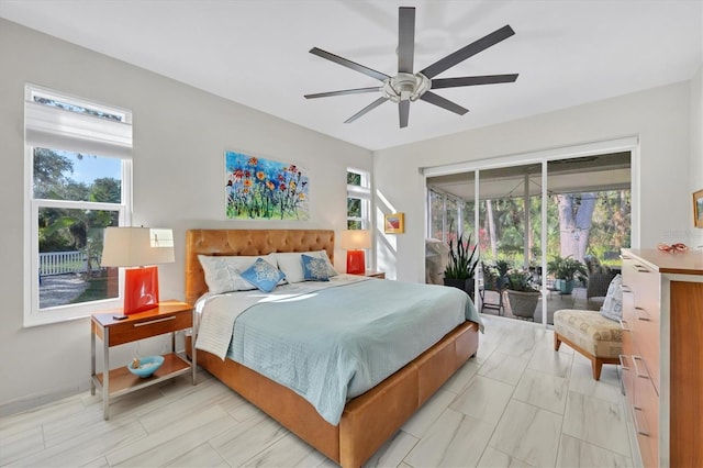 3301 River Woods Dr, Parrish, FL 34219 - bedroom featuring access to exterior and a ceiling fan