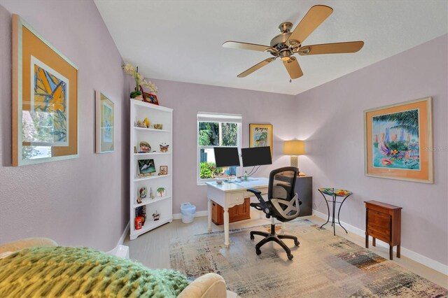 3301 River Woods Dr, Parrish, FL 34219 - office area featuring baseboards, a ceiling fan, and wood finished floors