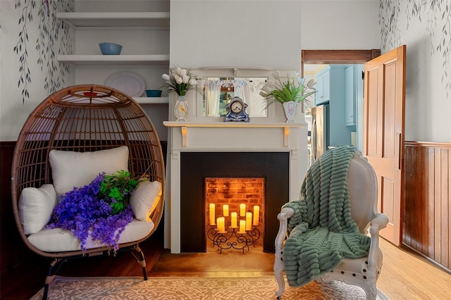 living area with wood-type flooring