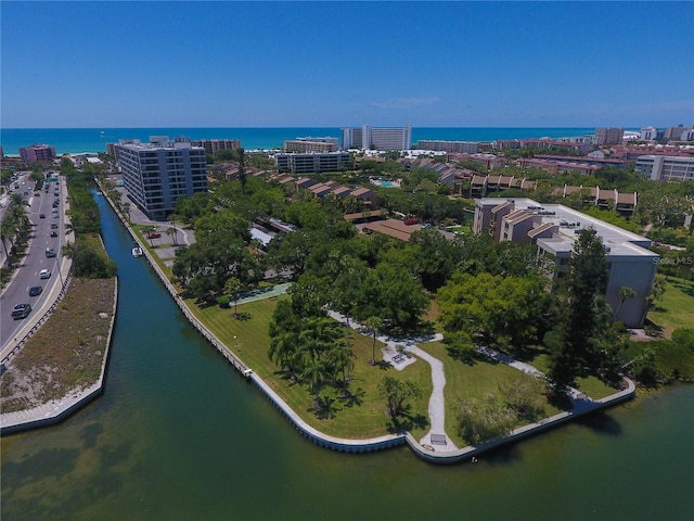 drone / aerial view with a water view