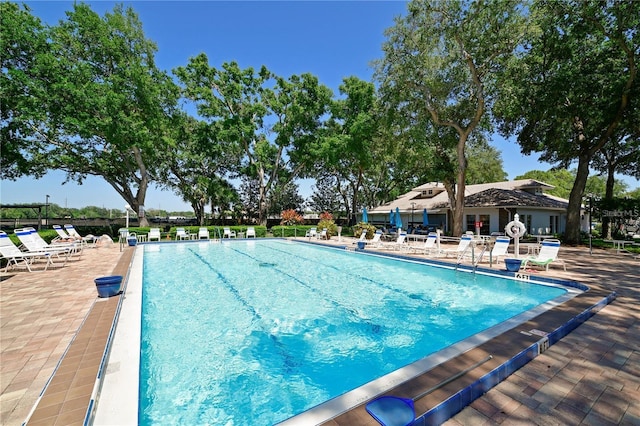 pool with a patio area