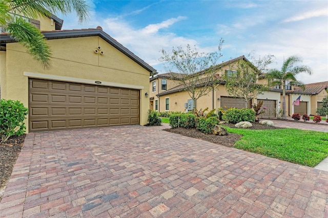 view of front of home with a garage