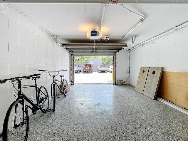 garage featuring a garage door opener