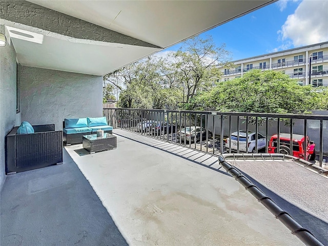 balcony with an outdoor hangout area