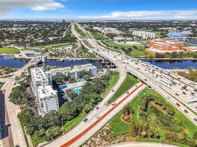 birds eye view of property with a water view