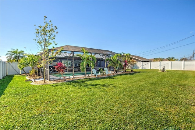 1413 SE 36th St, Cape Coral, FL 33904 - view of yard with a fenced backyard, a fenced in pool, and glass enclosure