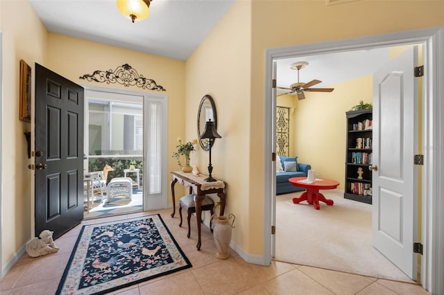 entryway featuring light tile patterned floors