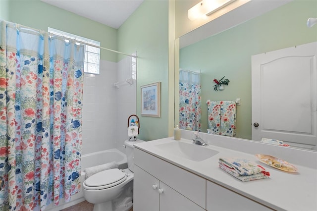 full bathroom featuring shower / bath combination with curtain, vanity, and toilet