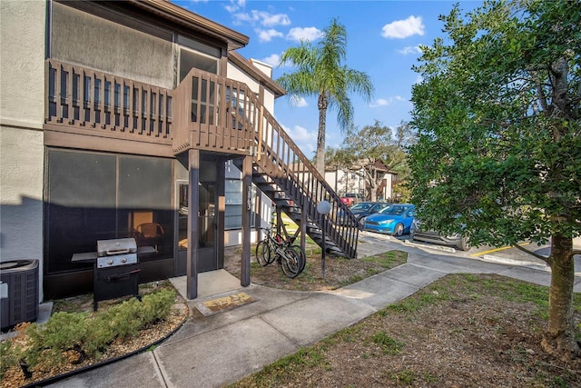 exterior space featuring central AC unit