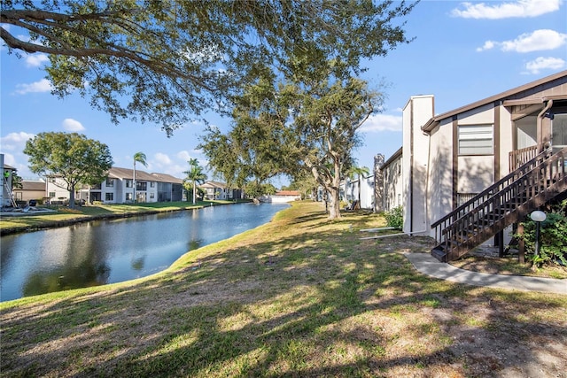 view of yard with a water view