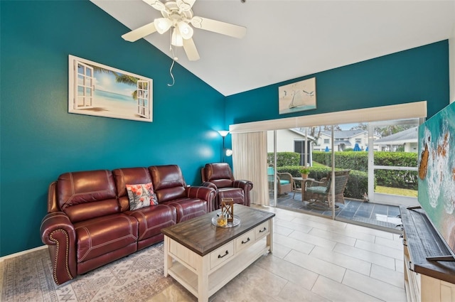 living room featuring vaulted ceiling, ceiling fan, and light tile patterned flooring