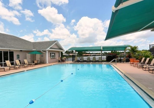 view of pool featuring a patio