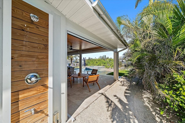 view of patio with ceiling fan