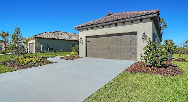 view of home's exterior featuring a garage and a lawn