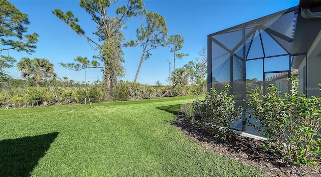 view of yard featuring a lanai