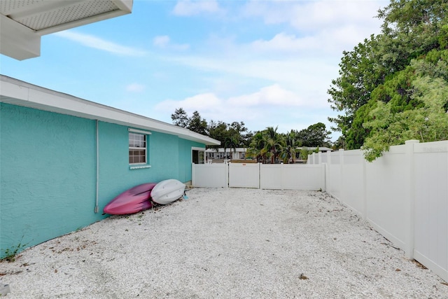 view of yard featuring a fenced backyard and a patio