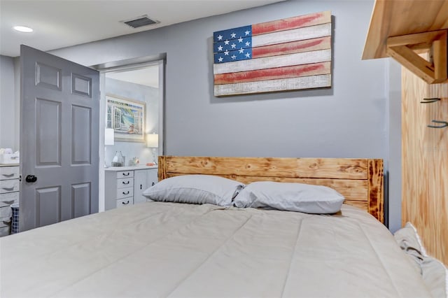 bedroom with visible vents