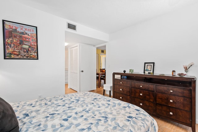 bedroom with light wood-type flooring