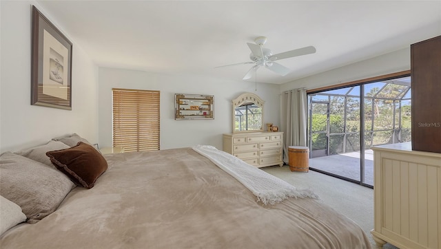 bedroom with access to exterior, carpet floors, and a ceiling fan