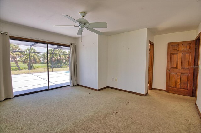 3837 Torrey Pines Blvd, Sarasota, FL 34238 - unfurnished room with light carpet, ceiling fan, and baseboards