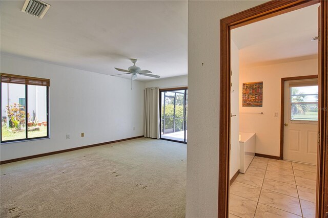 3837 Torrey Pines Blvd, Sarasota, FL 34238 - unfurnished room featuring baseboards, ceiling fan, and light colored carpet