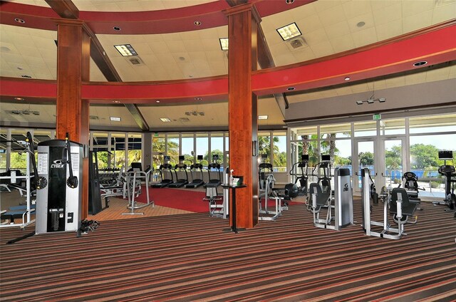 3837 Torrey Pines Blvd, Sarasota, FL 34238 - workout area featuring french doors, a high ceiling, carpet, and recessed lighting