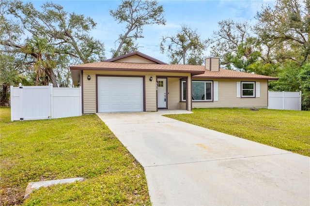 single story home with an attached garage, fence, concrete driveway, a front lawn, and a chimney