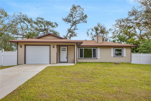 ranch-style house featuring a chimney, fence, a garage, driveway, and a front lawn