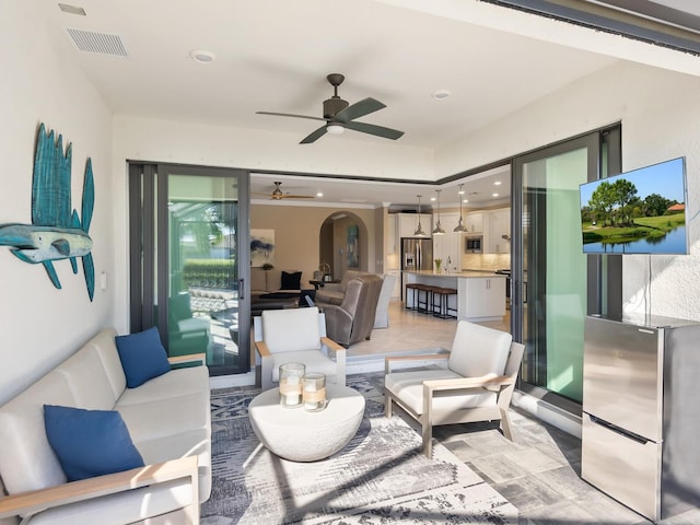 living room featuring ceiling fan