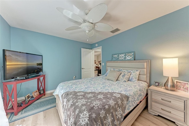 bedroom featuring ceiling fan and light wood-type flooring