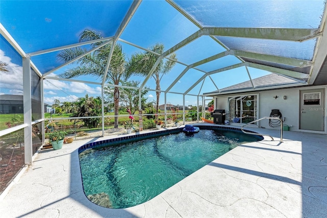 view of pool featuring a patio and a lanai