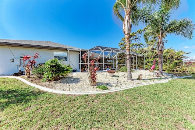 view of yard with a lanai