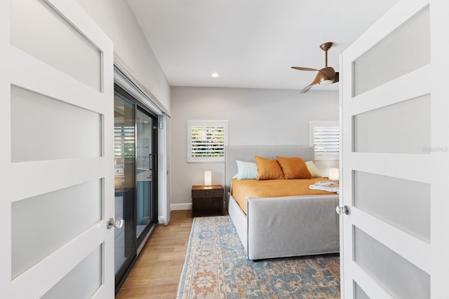 bedroom featuring wood-type flooring and ceiling fan