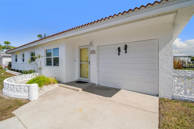 exterior space with a garage