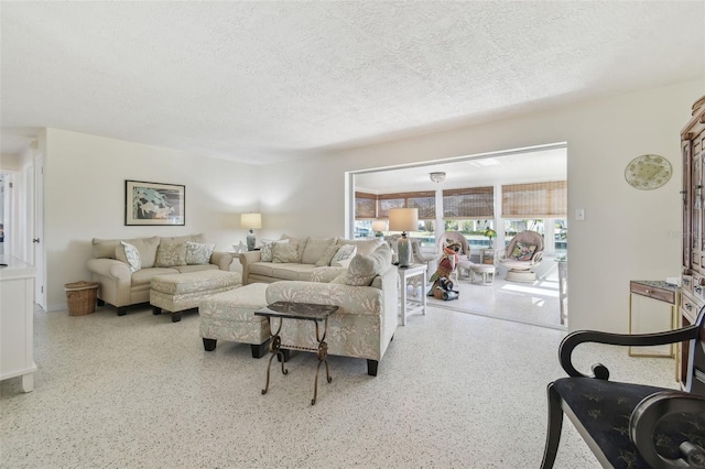 living room with a textured ceiling