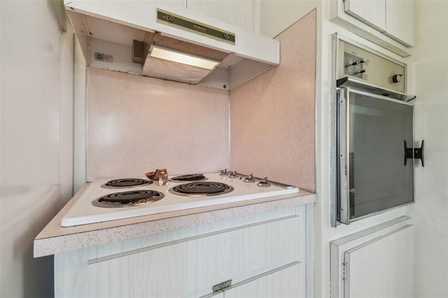 kitchen with white cooktop