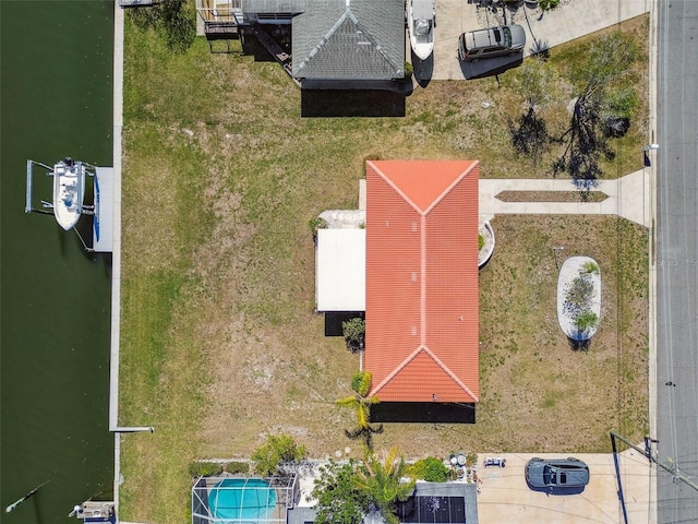 drone / aerial view featuring a water view